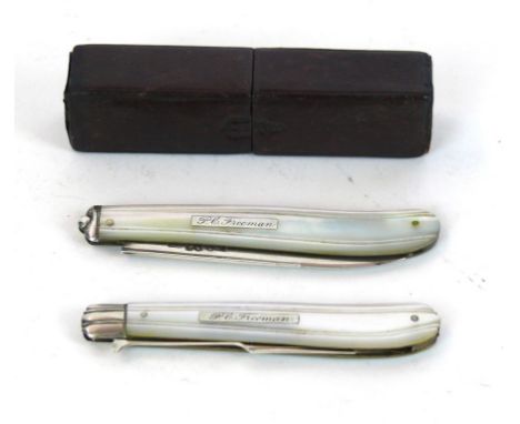 A Victorian hallmarked silver two piece campaign knife and fork
With mother of pearl handles and silver blades, one example m