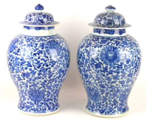 A pair of Kangxi style 'Lotus' vases, Late Qing Dynasty (1644-1912)
Each of baluster form, the rounded body with meandering l