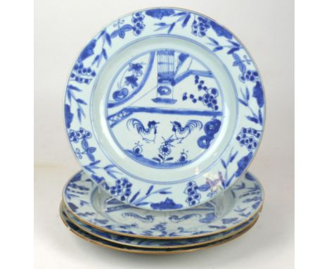 A collection of four 18th Century Chinese export porcelain plates 
Each of circular form with everted rim, the well of each p