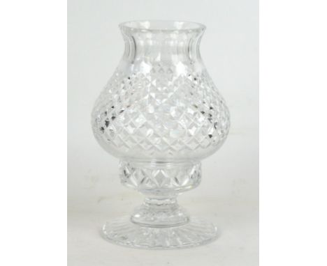 A Royal Brierley English crystal table lamp
The shade of inverted baluster form, raised on a pedestal base, height 26cm, comp