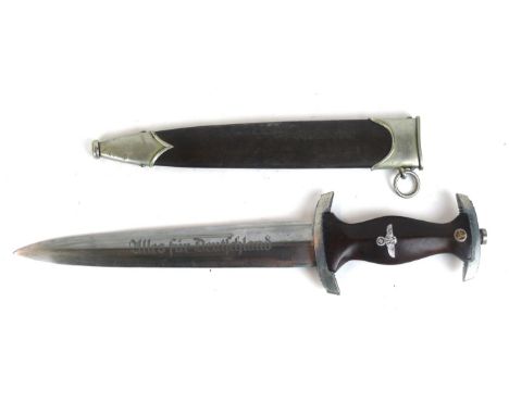 A Nazi Germany S.A. dagger
The 22cm straight double edged blade engraved Allesfur Deutschland, makers mark RZM further markin