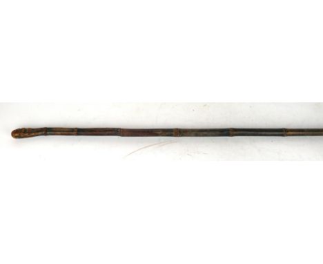 A late 19th Century sword stick
With 50cm square blade, bamboo grip with matching bamboo scabbard.