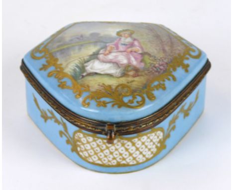 A 20th Century Sevres porcelain lidded trinket box
Decorated with a lady fishing at a river bank, on a turquoise blue ground,