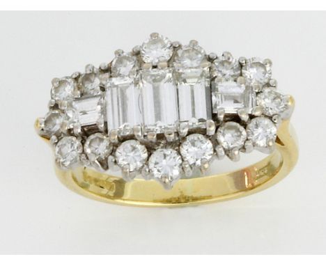 A fine quality hallmarked 18ct yellow gold and diamond ring
Featuring five central baguette cut diamonds, surrounded by a con