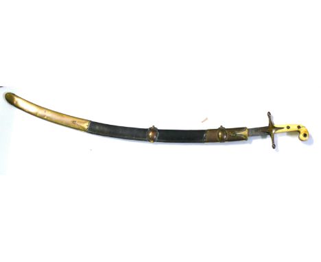 An Cavalry officers mameluke sword 19th Century
The 82cm curved single edged blade, with brass cross guard with incised decor
