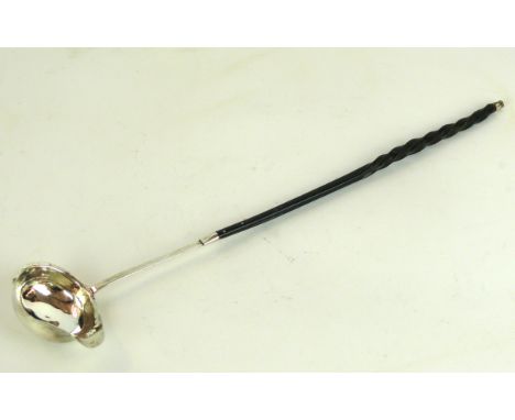 A George III hallmarked silver toddy ladle
With whale bone turned handle, the bowl of oval form, made by John Merry, London 1