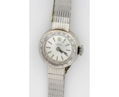 A Tissot ladies 9ct white gold bracelet watch 
With silvered circular dial of small elegant proportions, the 17 jewel movemen