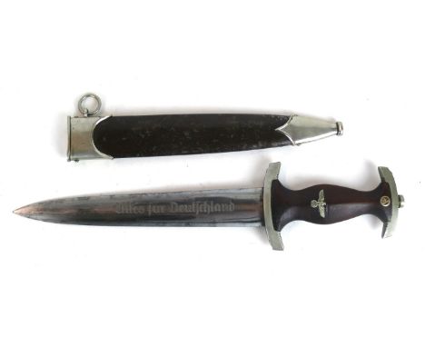 A Nazi Germany S.A. dagger
The 22cm straight double edged blade engraved Allesfur Deutschland, makers mark F Herderas Solenge