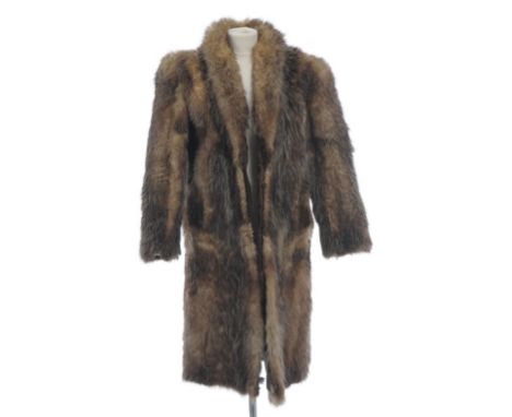 A vintage wolf fur coat
The three quarter length coat, with narrow collar and brown, and white collared fur, the interior wit