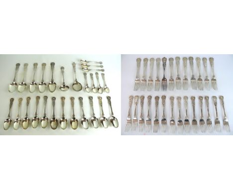 A fine quality Victorian hallmarked silver flatware service
Comprising five large serving spoons, twelve dessert spoons, six 