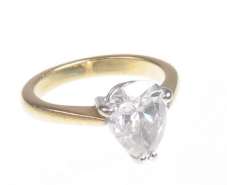 A pear shaped diamond solitaire ring, approximately 1ct
Claw set on an unmarked yellow and white gold mount, ring size E.5, 3