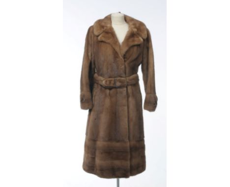 A vintage  ladies full length belted fur coat, possibly mink, circa 1970s
Retailed by Browns of Chester, the light brown coat