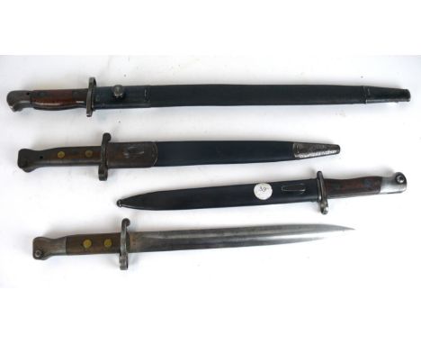 A British long Lee Enfield 1888 Mk I bayonet
The 30.5cm straight double edged blade, marked with Queen Victoria's cypher surm