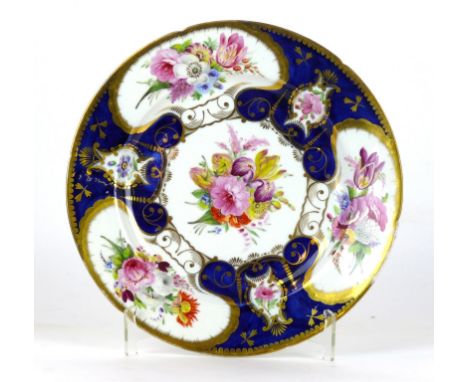 A 19th Century Worcester scale blue hand painted plate
Decorated with panels of floral sprays inside a cobalt blue and gilt b