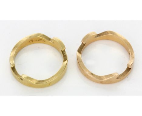 Georg Jensen 
A pair of 18ct yellow gold puzzle rings, 11.9gms.  CONDITION REPORT: Lot 1109 - ring size P 1/2 (for both), in 