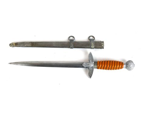 A Nazi Germany Luftwaffe dagger
25cm straight double edged blade, cross guard decorated with eagle and swastika, ivorine grip