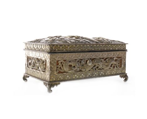 20TH CENTURY CHINESE WHITE METAL CASKETthe detachable lid cast in relief with bamboo, the sides each pierced and cast with dr