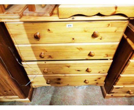 An 84cm modern pine chest of four long drawers, set on bracket feet