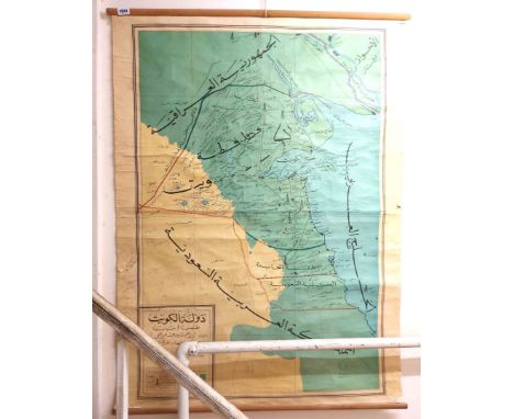 A vintage Middle Eastern wall hanging map on canvas backing with Arabic text 'Kuwait, Naturally and Politically' and showing 
