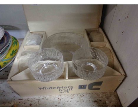 A vintage Whitefriars fruit set comprising one large bowl and six smaller bowls with textured bark effect finish in the flint