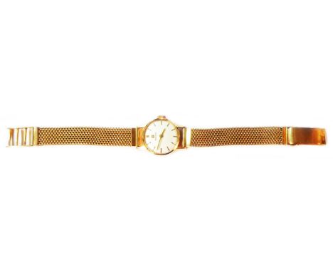 A vintage 750 (18ct.) gold cased lady's Tissot wristwatch with seventeen jewel movement, on Italian marked 750 mesh-link brac