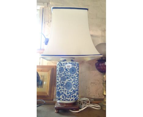A blue and white Chinese style ceramic table lamp - sold with shade