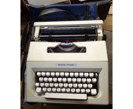 A vintage Boots PT500 typewriter in blue carry case