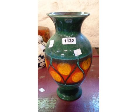 A large vintage West German pottery vase with a central band of abstract orange and red decoration on a mottled green glaze g
