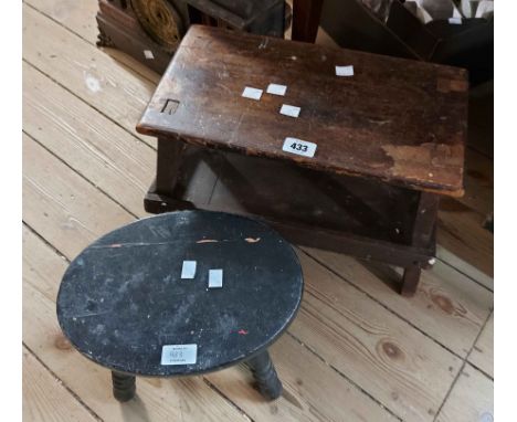 A vintage stained wood stool with undertier, set on simple supports - sold with an ebonised wood stool with oval top