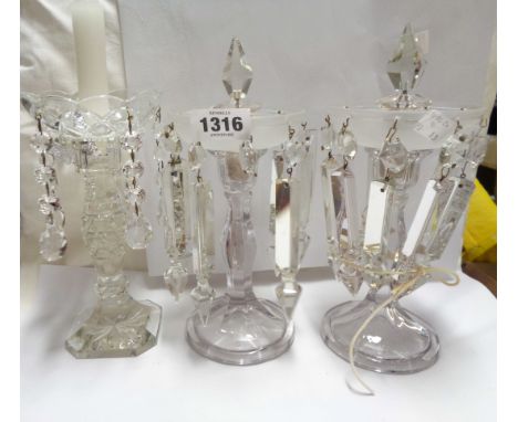 A pair of early 20th Century table lustres with molded candlestick form bases, frosted sconce and cut lustre drops - sold wit