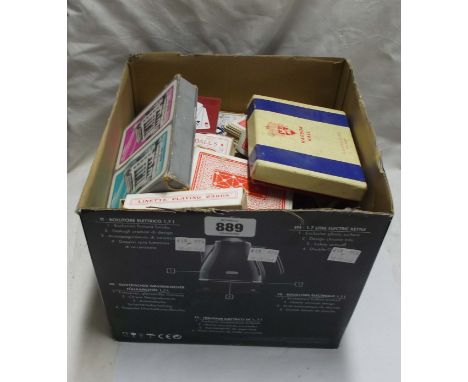 A box containing a quantity collectable items including a large quantity of boxed playing cards, Bezique game, a quantity of 