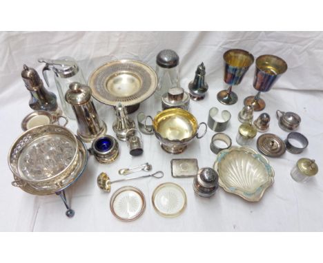 A box containing a quantity of silver plated items including small tea caddy, stands, spirit burner base, casters, etc.