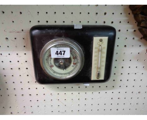 A vintage small stained wood cased wall barometer/thermometer with aneroid works