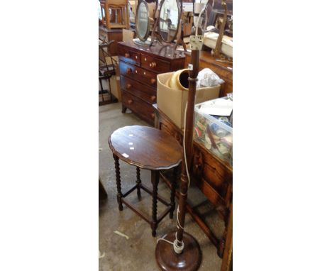 A vintage stained beech standard lamp with turned pillar and circular base - sold with a 1920's polished oak occasional table