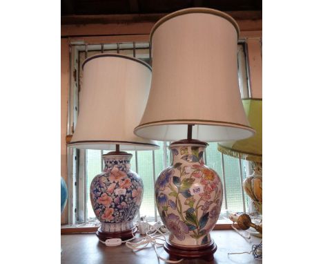 Two bulbous ceramic table lamps with a floral decoration - sold with shades