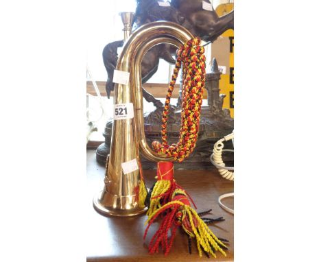 A modern brass bugle