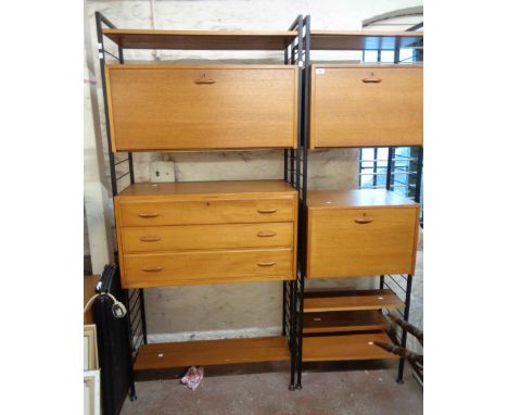 A vintage Ladderax storage unit with four uprights, three drawer chest, fall-front drinks cabinet, two record storage cupboar