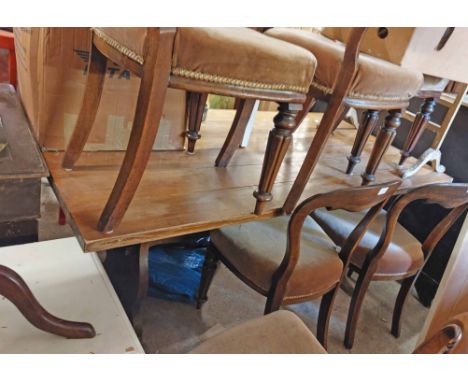 A 1.68m vintage polished mixed wood refectory dining table, set on shaped standard ends with pegged stretcher