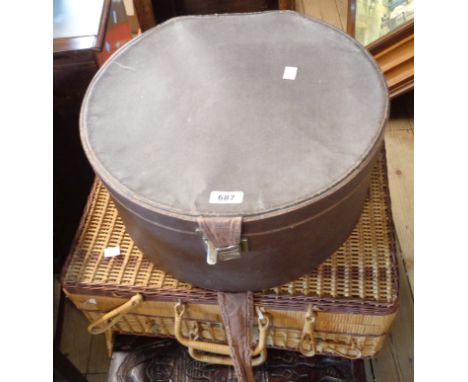 An old wicker picnic hamper containing a small quantity of picnic items - sold with a vintage hat box containing a lady's fas