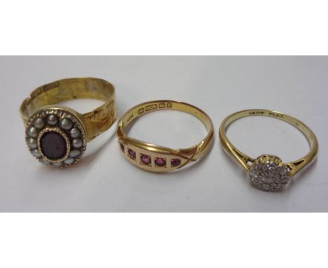 An antique 18ct. gold oval panel ring, set with central flat garnet within a seed pearl border - sold with a 1904 15ct. gold 