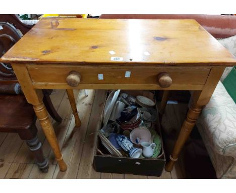A 75cm vintage pine side table with frieze drawer, set on turned legs - bearing label for Trevor Page, Norwich