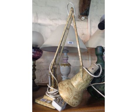 A vintage Herbert Terry metal anglepoise lamp with original scumbled decoration