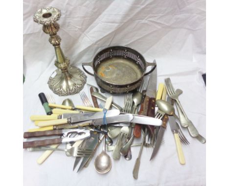 A box containing a silver plated candlestick, silver plated cutlery, etc.