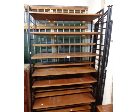 A vintage Ladderax shelving unit comprising five uprights, eight large shelves and nine smaller shelves