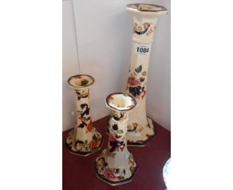 A large Mason's Ironstone candlestick, decorated in the Mandalay pattern - sold with a pair of smaller similar