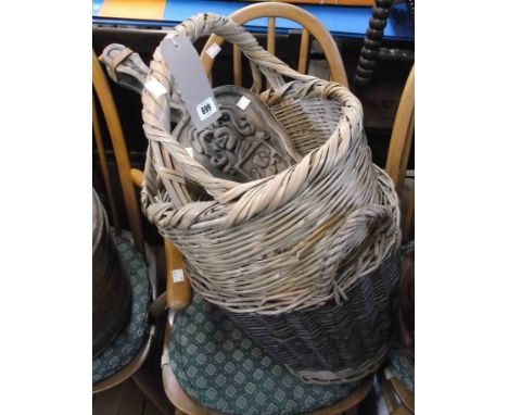 Two wicker log baskets - sold with a pair of vintage carved wood bellows