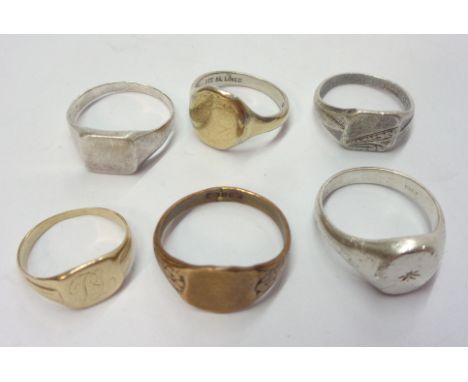 A marked 9ct. yellow metal signet ring with engraved initials to top - sold with a blank yellow metal similar - sizes J and R