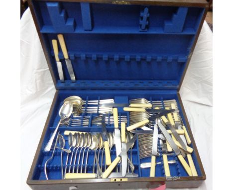 A vintage oak canteen containing a part twelve place setting of Mappin &amp; Webb silver plated cutlery