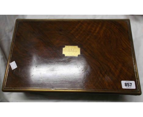 A 19th Century mahogany brass bound writing slope with fitted interior including glass inkwell and cartouche to the lid with 