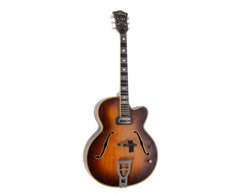 A HOFNER ELECTRIC ACOUSTIC GUITAR, the fingerboard with mother of pearl decoration and with maple back